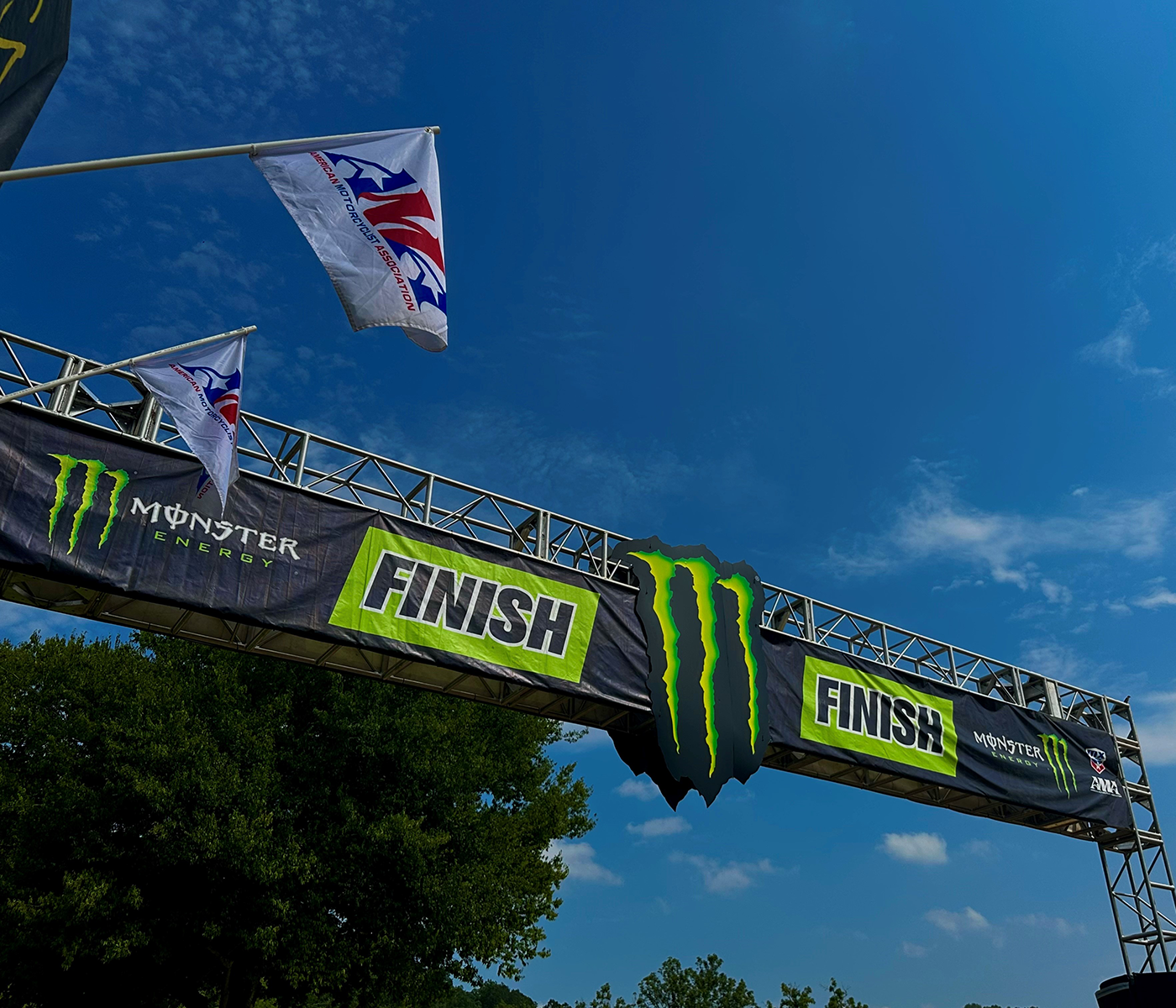 AMA Flags displayed at the finish line.