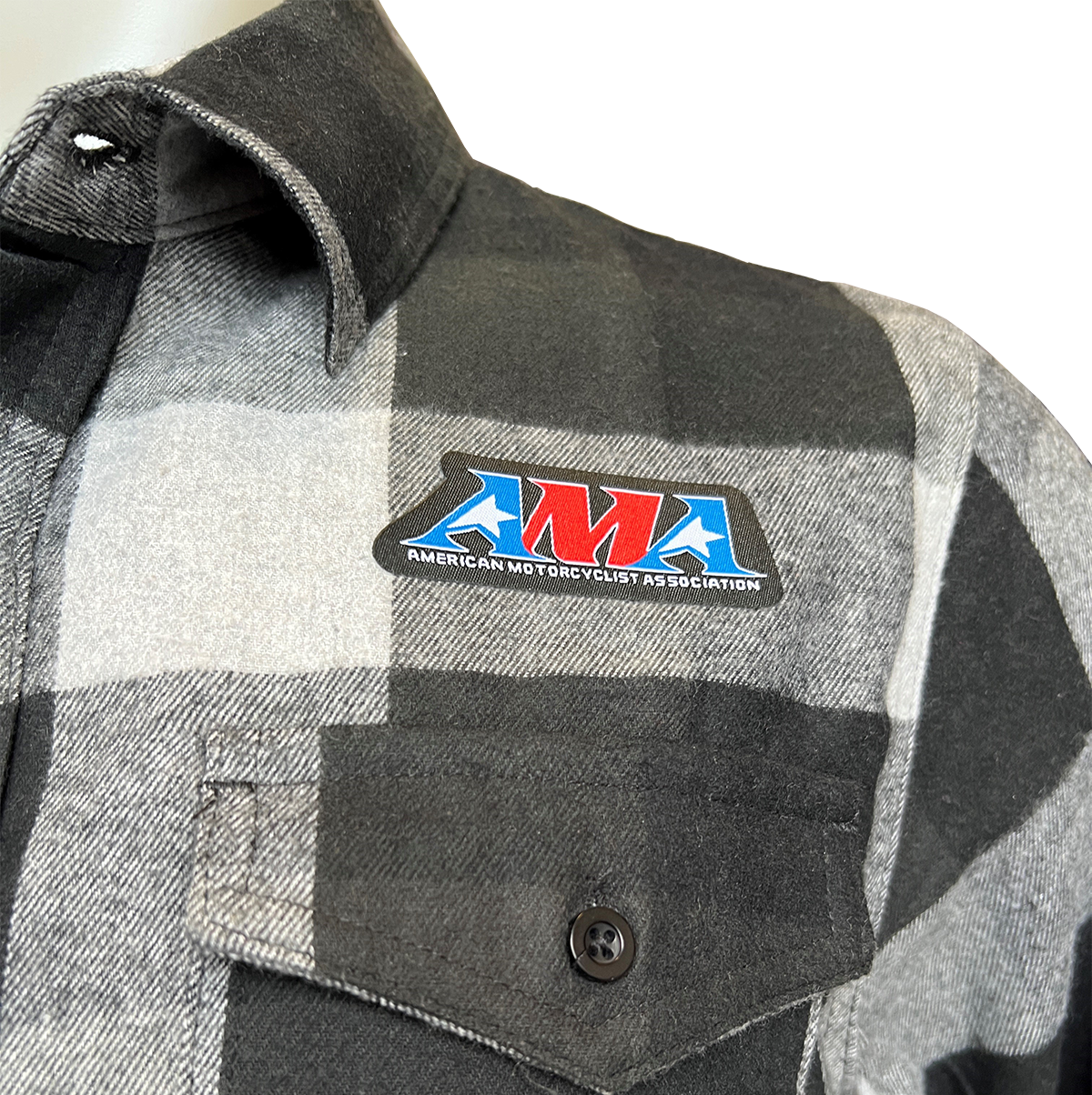 Close-up of patch on AMA Black and Grey Flannel